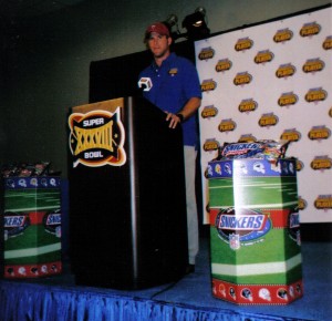 Brett Favre, shown here during an event for Snickers during Super Bowl XXXVIII made some people snicker when it was leaked that the St. Louis Rams were interested in the twice retired quarterback. For the record, Favre said no. Photo R. Anderson